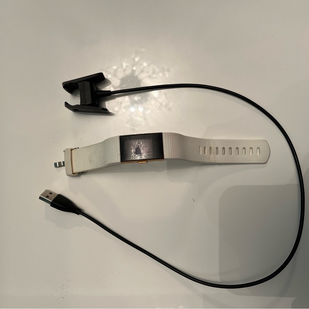 Fitbit with charger - not sure if sensor is 💯 working